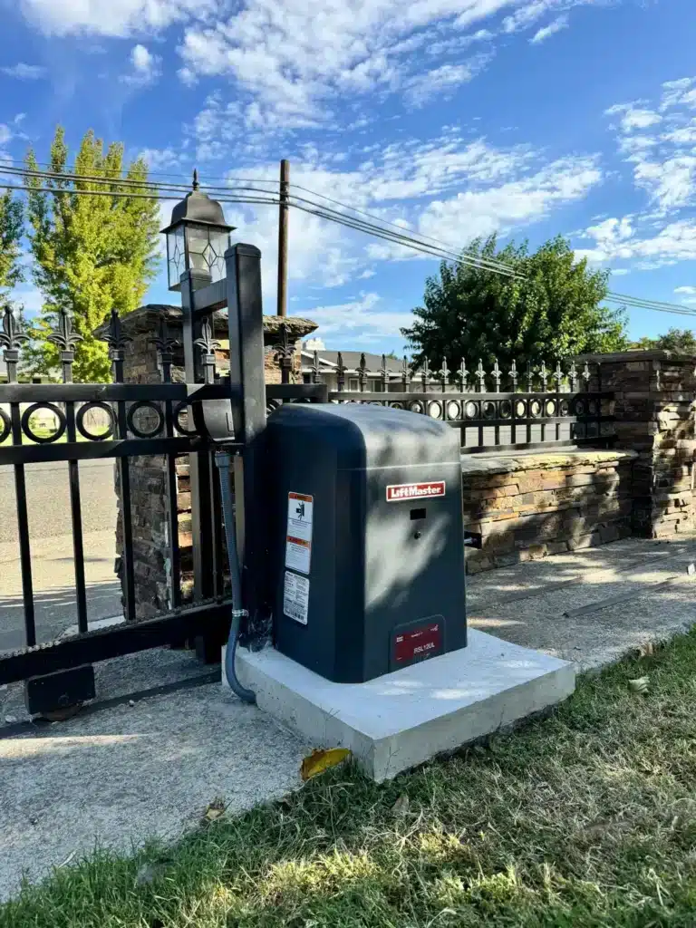 Photo Of Liftmaster Sliding Gate Motor On Concrete Pad Showing Difference Between Solar And Electric Gate Openers